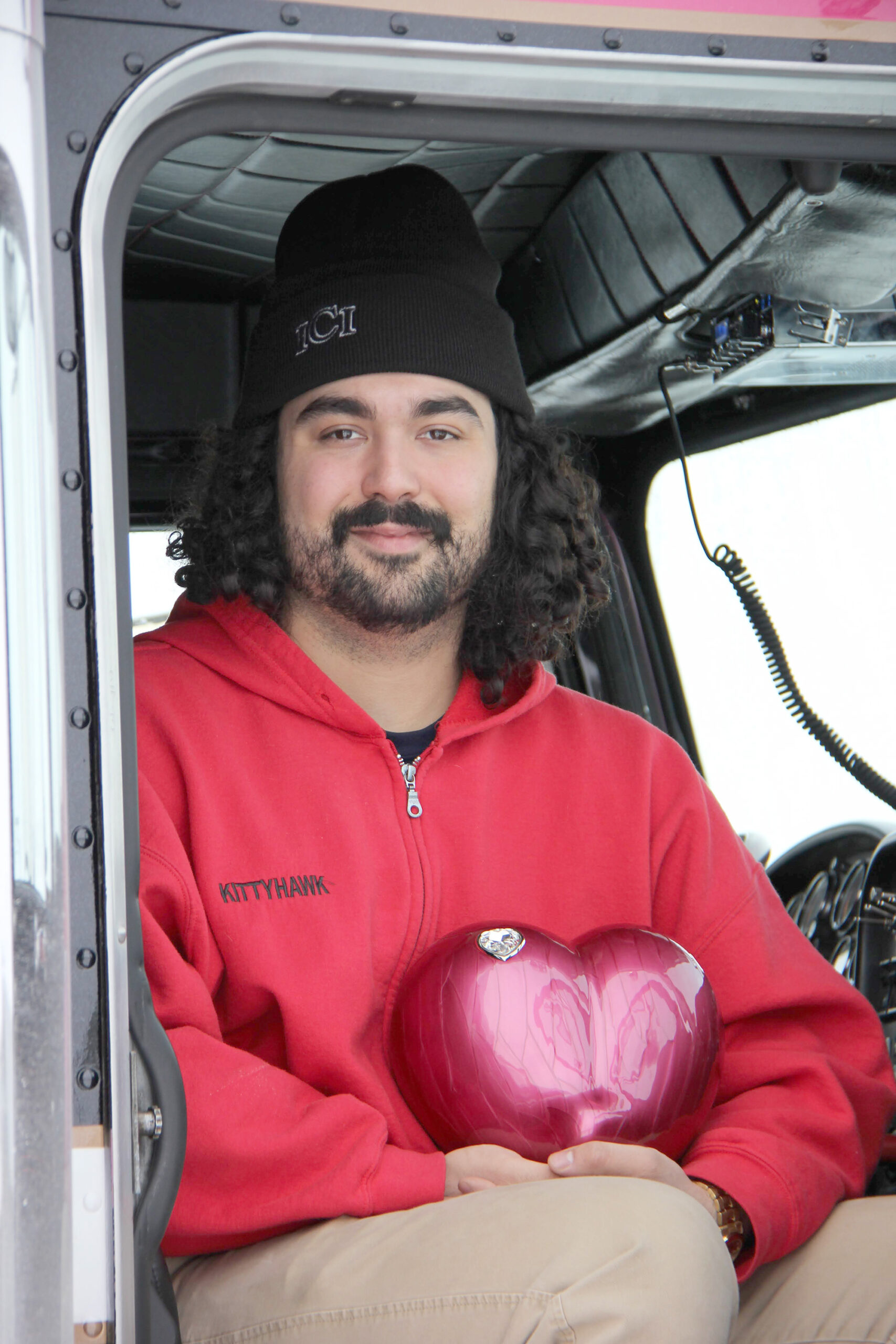 Jordan Prato, middle son of Teresa “Kittyhawk” Prato (Wheatman), with his mother’s urn on the road to Tweed.