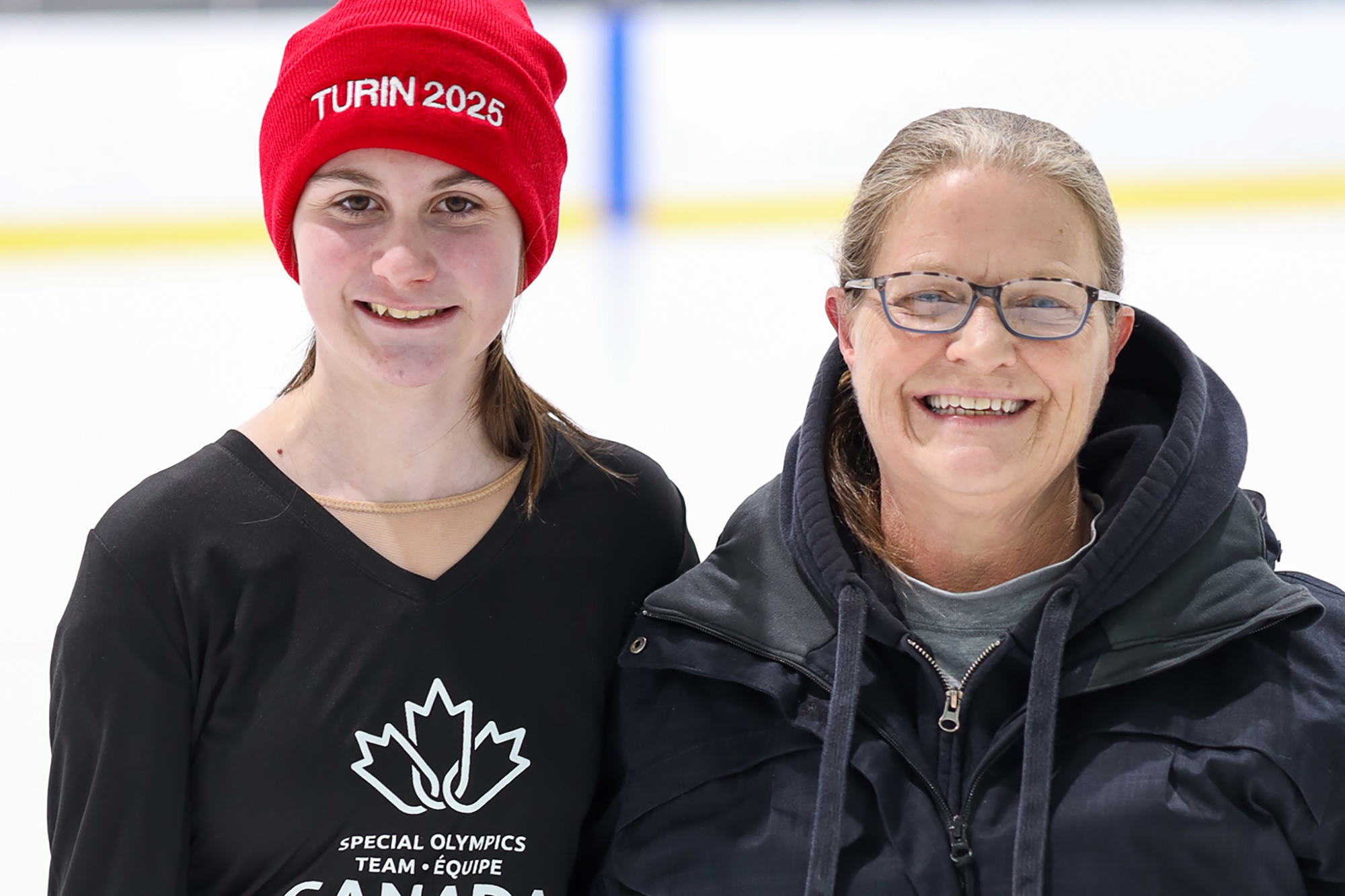 Breanna Willams with her coach, Laurie Horne-Klassen pose on the ice.