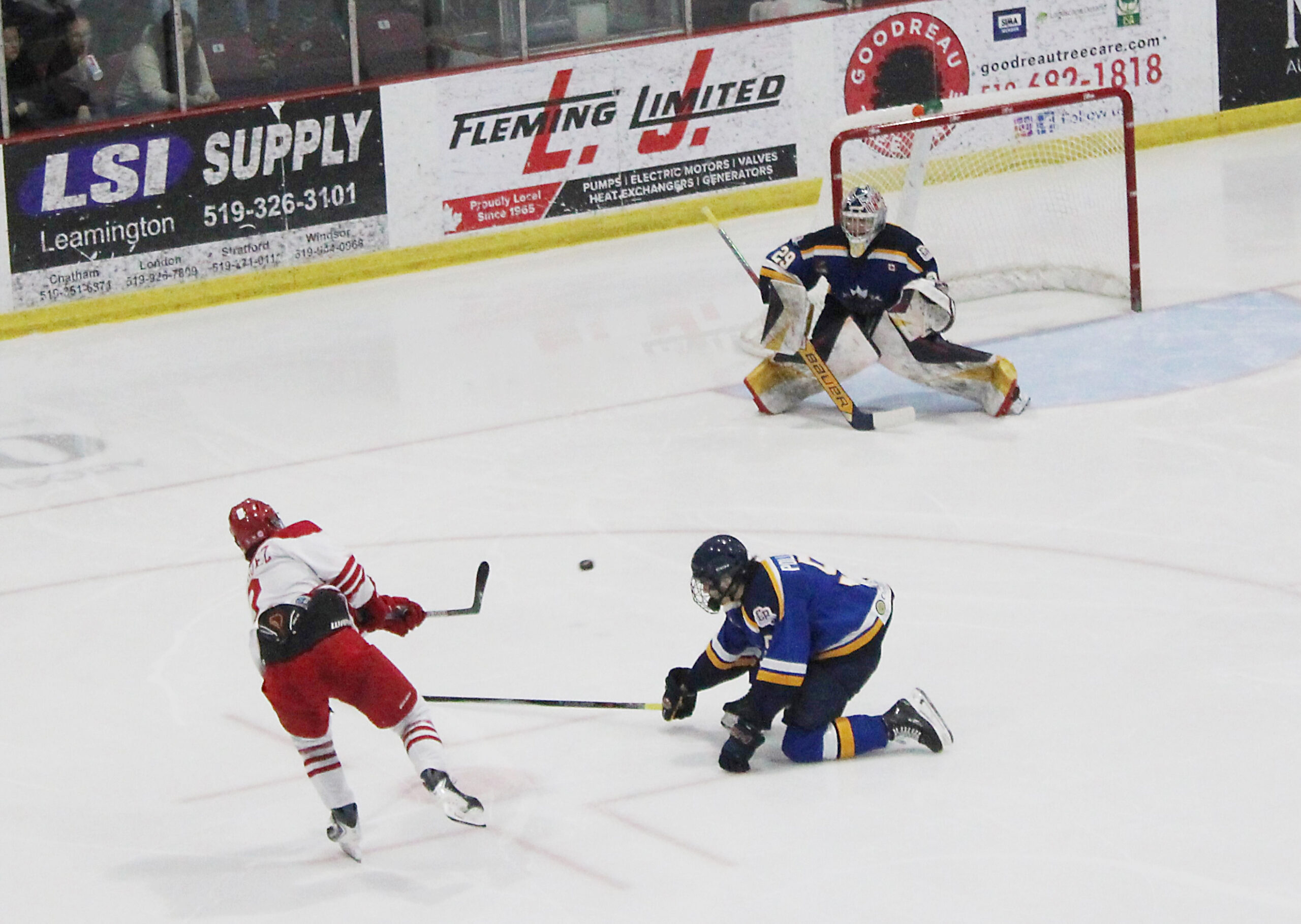 Flyer Vincent Gasquez (2) battles Blues’ player Declan Bowmaster at 12:21 of the second period during last Thursday night’s game four 3-0 loss here, which left the series at 3-1 for Collingwood. Scott Holland photo