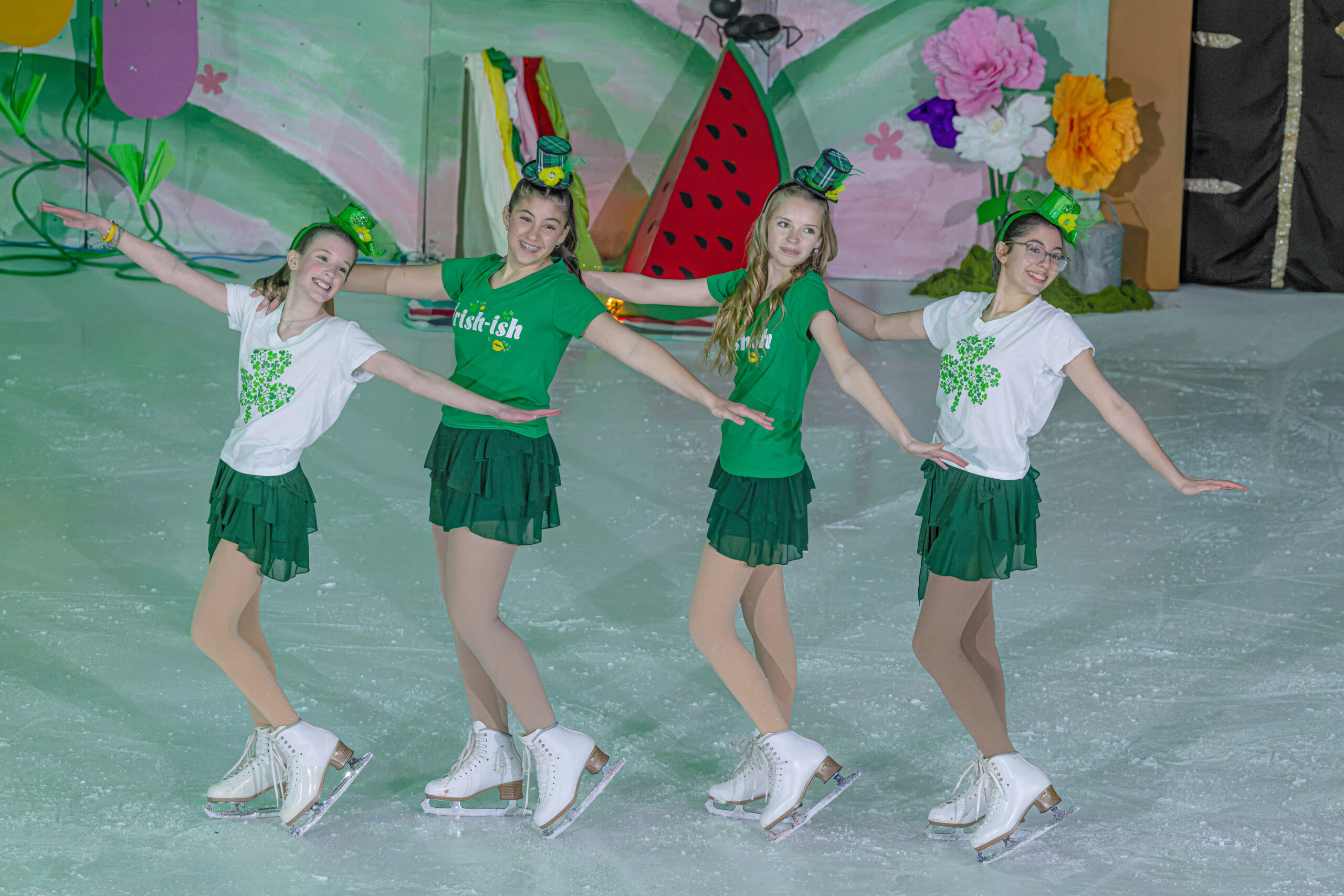 Camryn Barnewall, Eliana Perciballi, Katie Desborough and Carina Perciballi perform a St. Patrick’s Day–themed number during Skate Wheatley’s A Symphony of Seasons carnival on April 11 at Wheatley Arena.