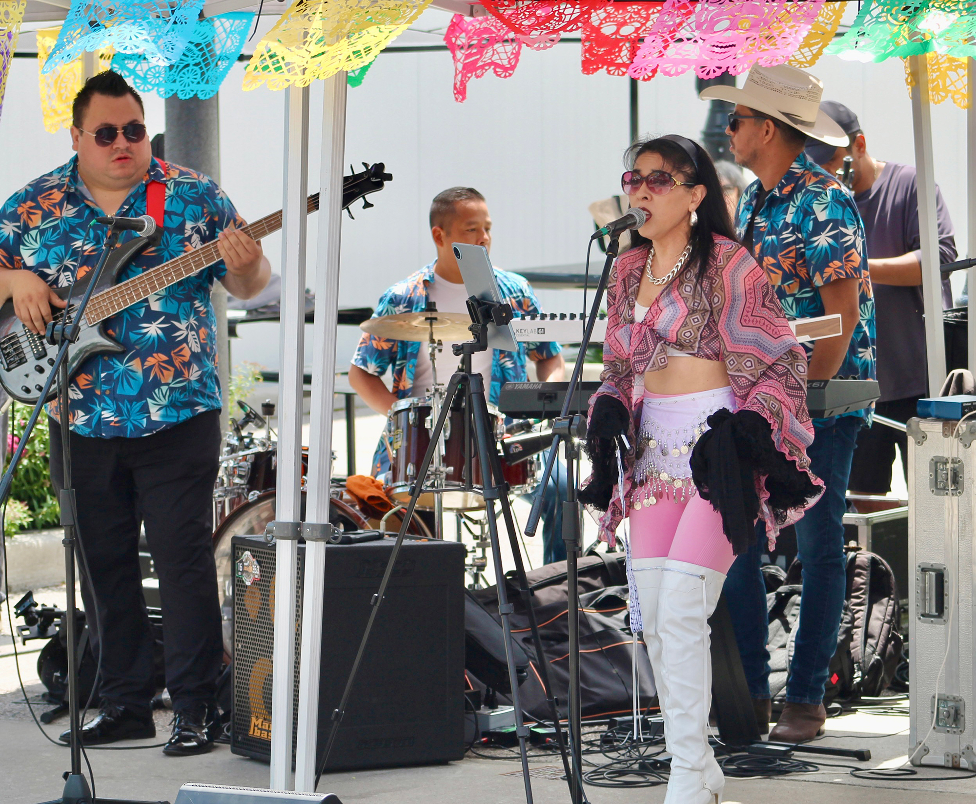 Sabor Latino entertains visitors with a live musical performance at the Mexican Village during Carousel of the Nations on June 21.