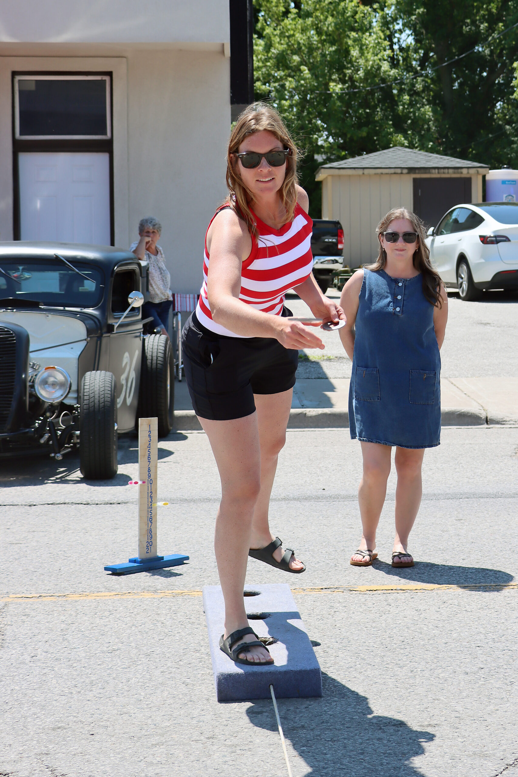 Sarah Simpson throws a steel washer during the Legion waddies tournament at the Wheatley Fish Festival.