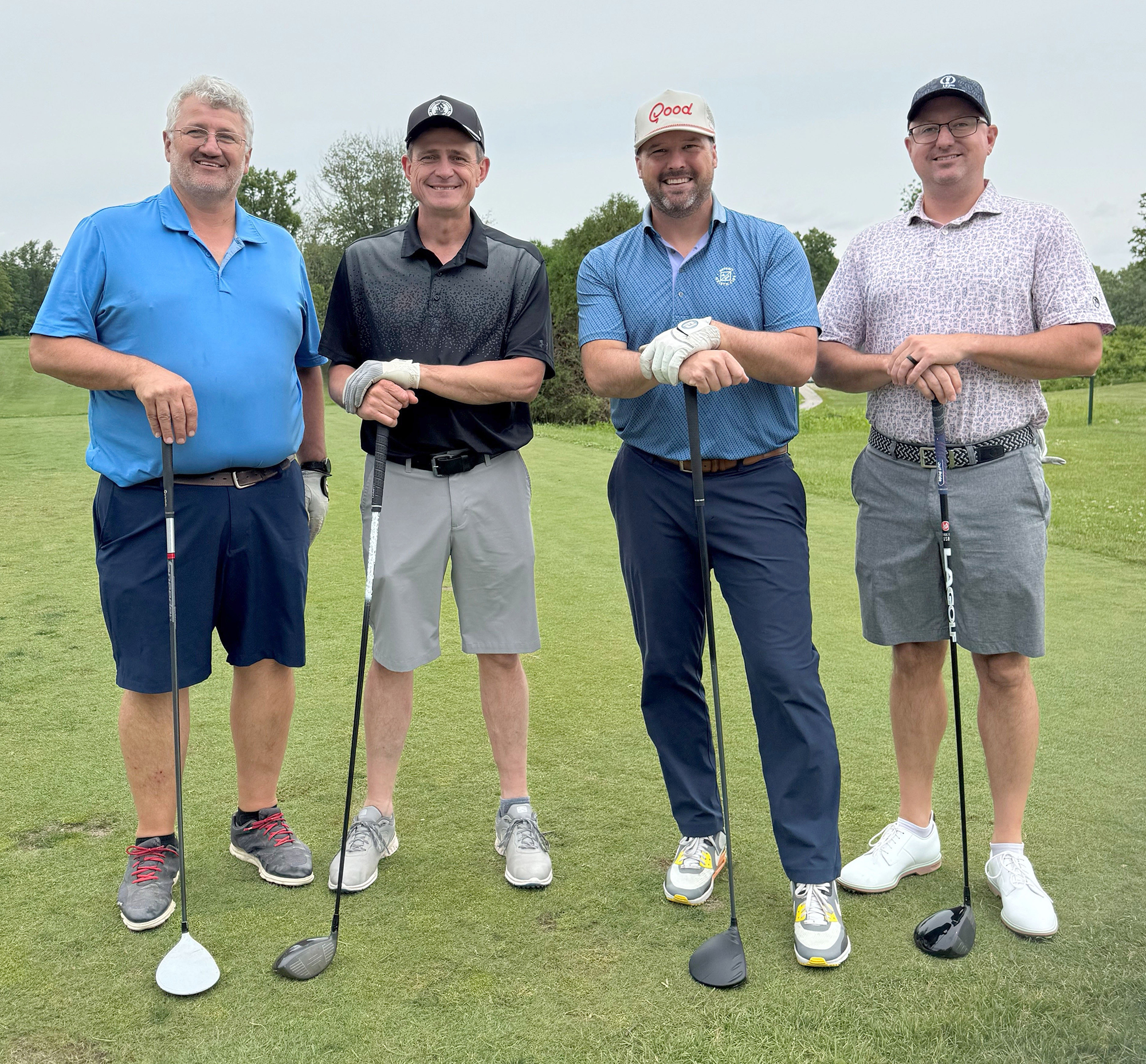 Winning men’s team members Pete Fehr, George Bergen, Matt Snoei and Ryan Sanger celebrate their victory at the HL Tiessen Foundation golf tournament in Kingsville.