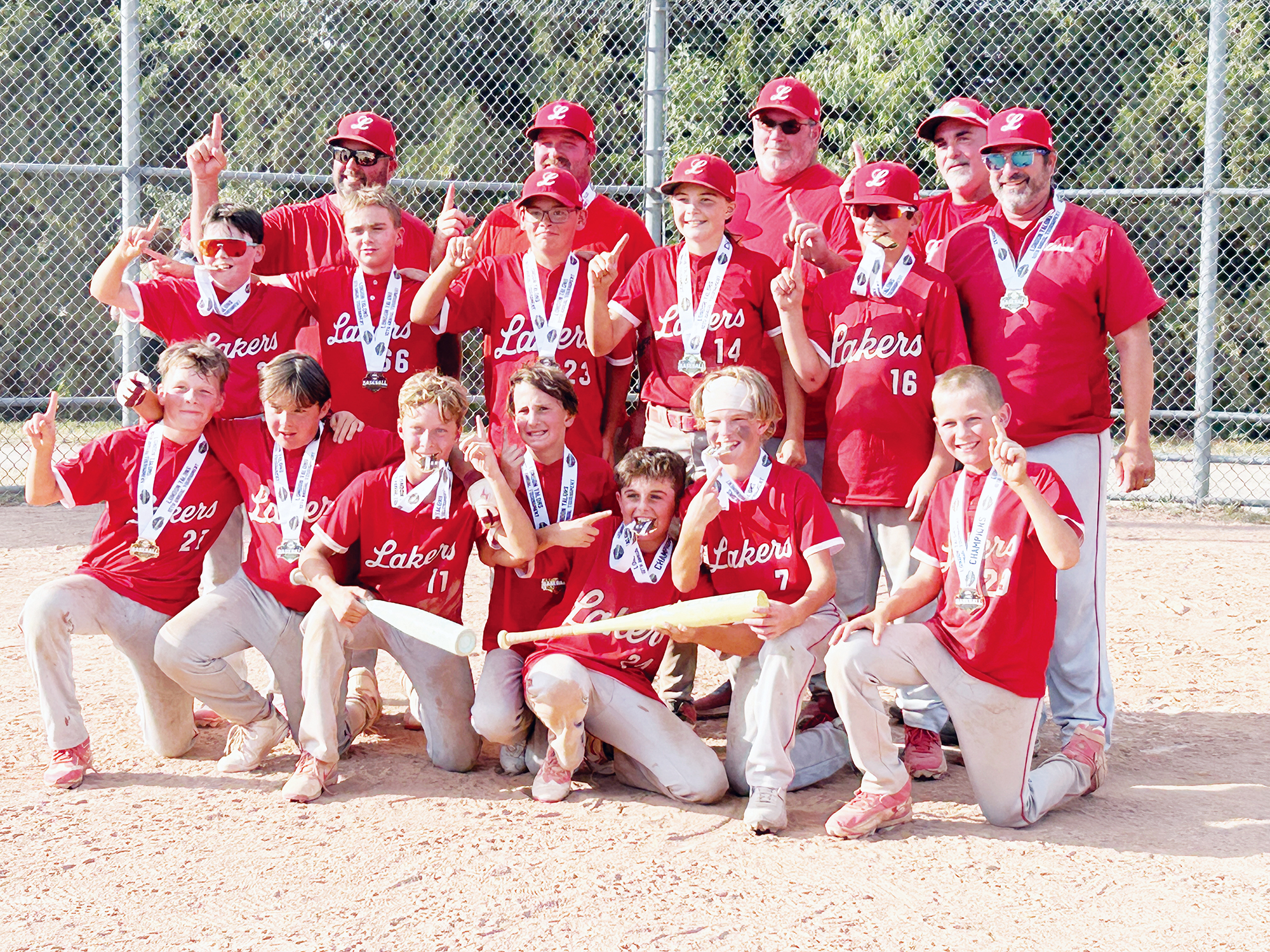 The Leamington Lakers 12U team celebrates its championship victory at the London Talons Baseball Tournament.