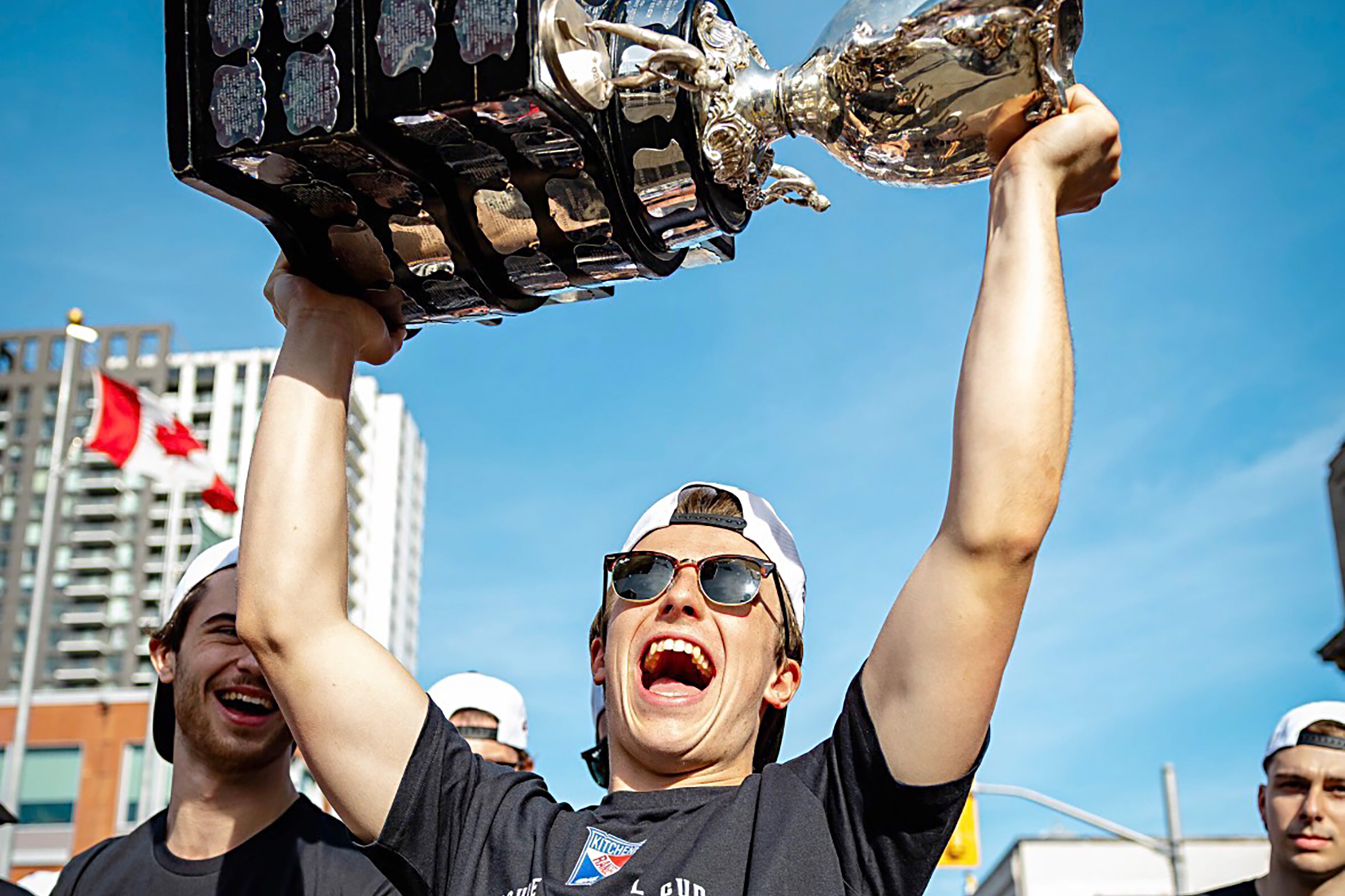 Wheatley's Cameron Arquette raises the Memorial Cup following the Kitchener Rangers' championship season.