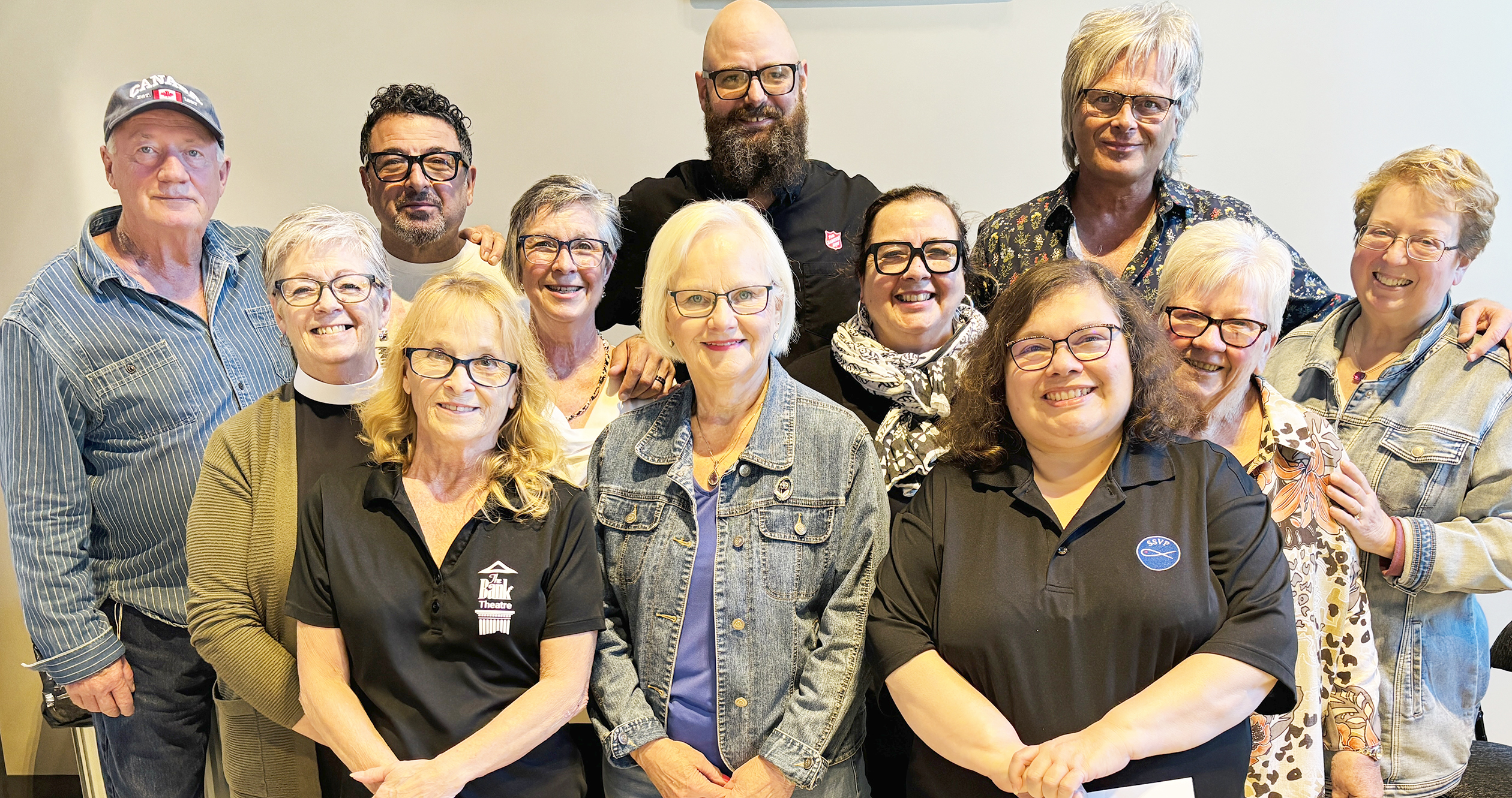 Concertgoers donated thousands of dollars as well as a trunk load of goods at The S’Aints annual Rock Seacliff to Fight Hunger concert that was held in September. The cash and goods will be split between five local ministries. Pictured are, back row, left to right: John P Moran, Event Co-Producer & President, The Bank Theatre; Jody Raffoul, Music lead singer & Co-Founder of The S’Aints; Derik Hyatt of Leamington Salvation Army; Jeff Burrows drummer and Co-Founder of The S’Aints. Middle row: Deborah Wilson-Safa, Deacon at St. John the Evangelist Anglican Church; Marilyn Miller of St. Paul’s Lutheran Church; Carmen Smith, Volunteer at The Bank Theatre and St. John’s Anglican Church; Lillian Brisseau and Melodee Lovering of Leamington United Church. Front row: Michelle Fortier, Event Co-Producer and The Bank Theatre Manager; Shirley Chorba, Leamington United Church; Veronica Costa, St. Vincent de Paul.
