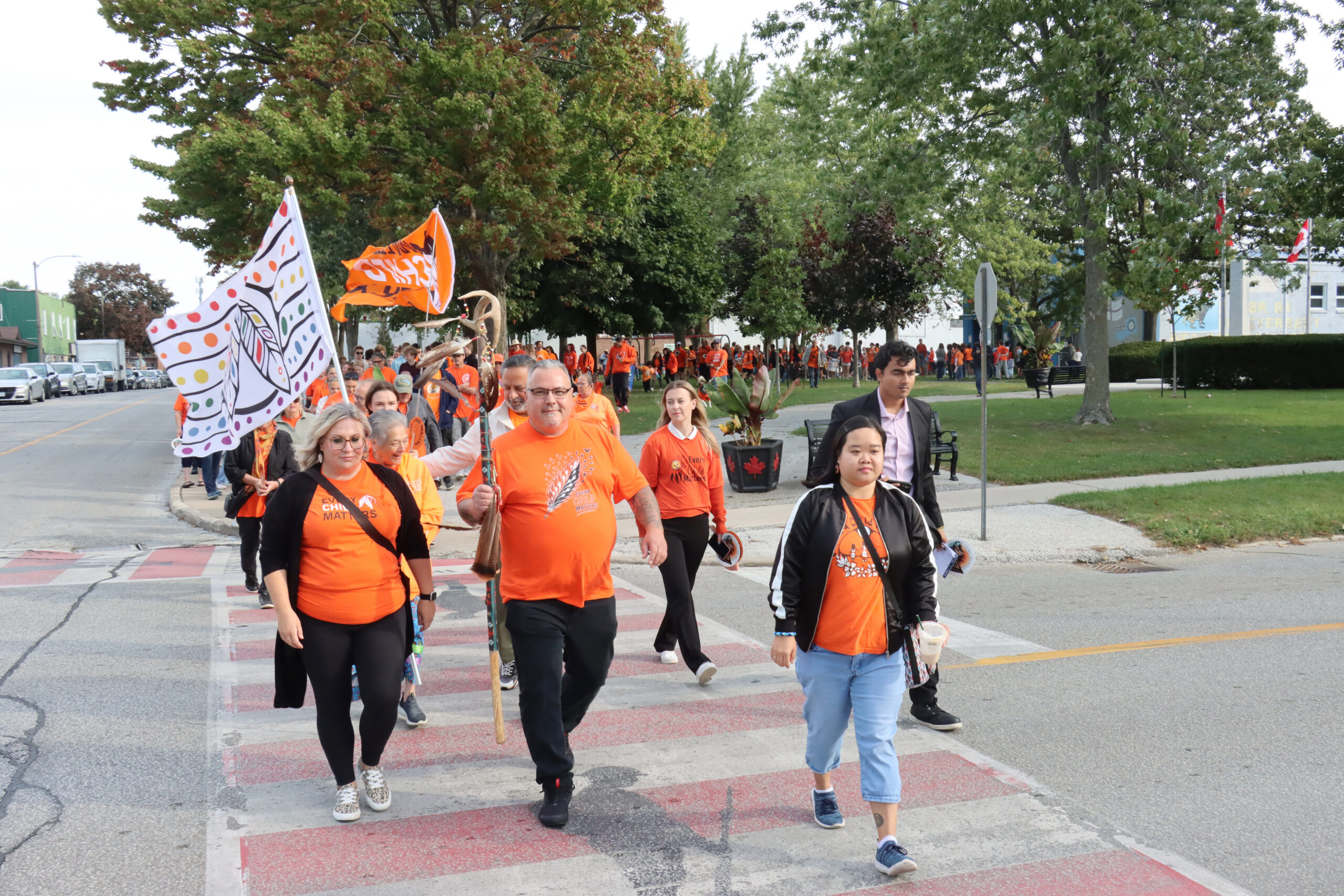 Caldwell Chief Nikki van Oirschot, left, and Councillor Randy DeGraw, middle, led the way for the Leamington Orange Shirt Day walk to bring awareness to the National Day for Truth and Reconciliation on Wednesday, September 30.