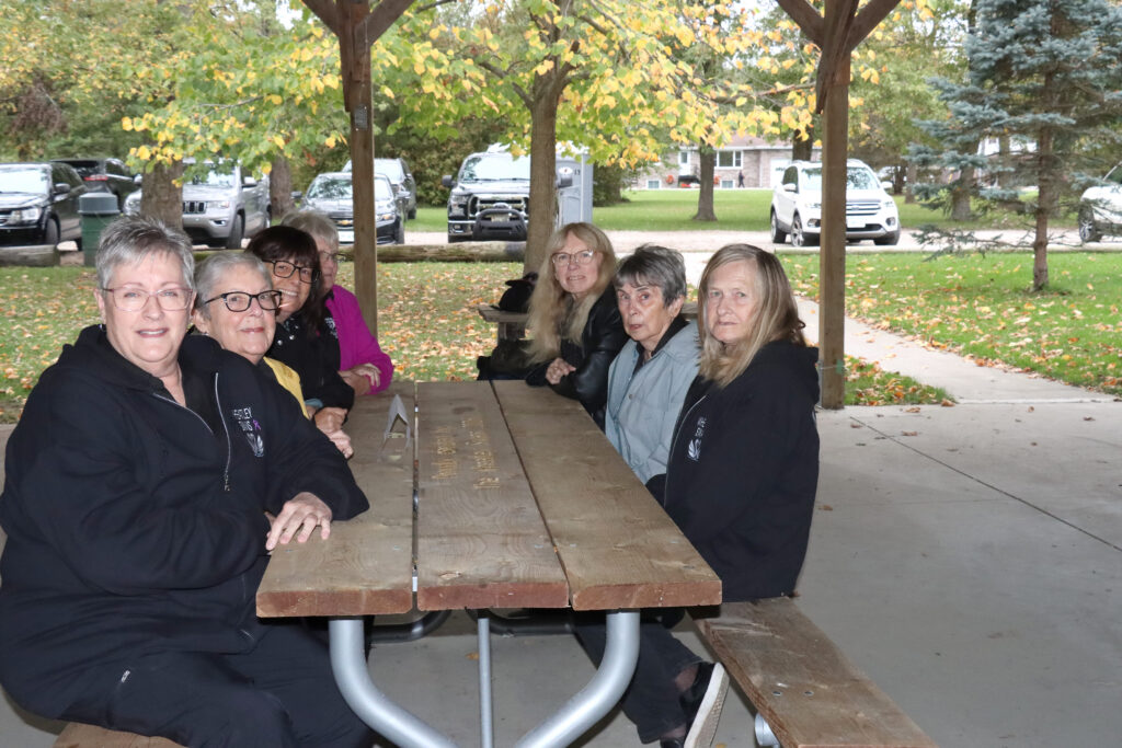 The Wheatley Swans sat at their table for the event.