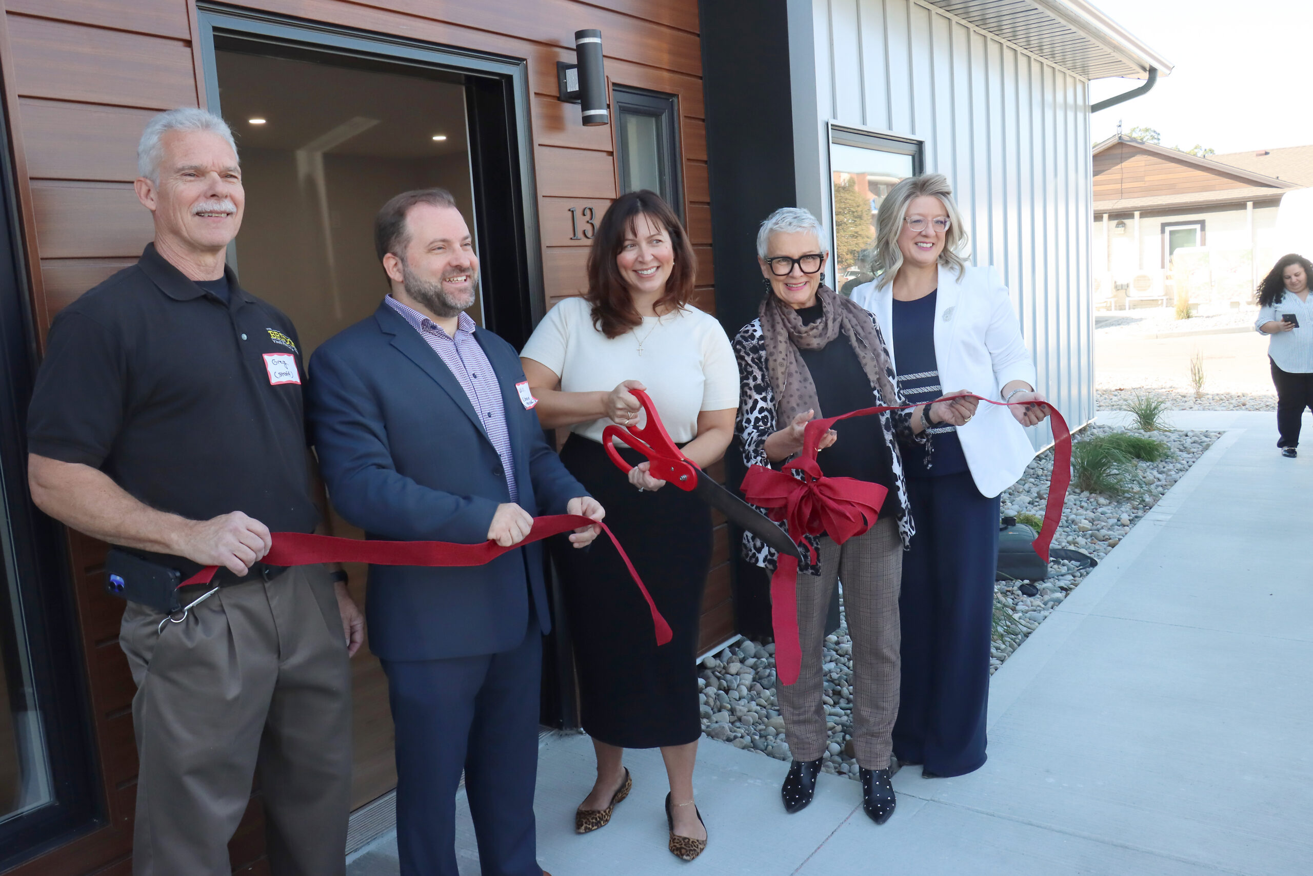 Greg Wiens, Will Good, Krista Rempel, Hilda MacDonald and Sandra Zwiers were the guest speakers at the ribbon cutting for the Erie Bridge Homes initiative on Sherk Street in Leamington.